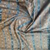 Light brown sambalpuri cotton fabric with blue Ikat stripes - Image 3