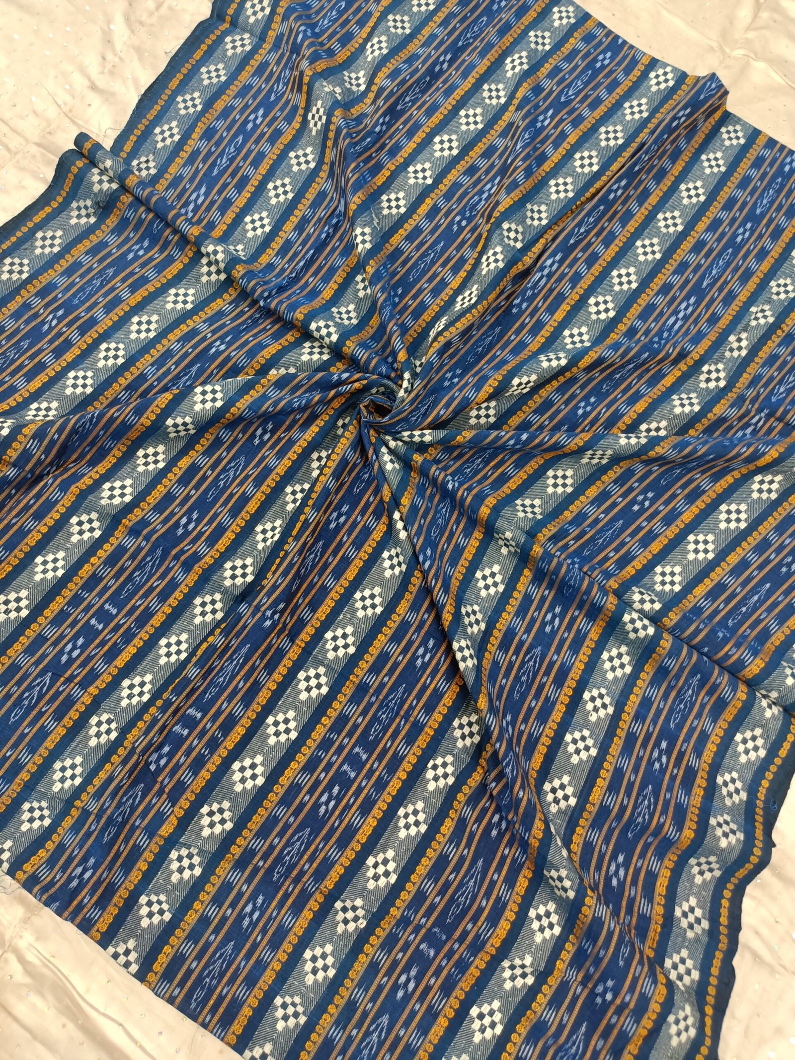 Blue sambalpuri cotton fabric with vertical saptapar bomkei pattern ...