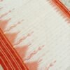 White sambalpuri cotton saree with orange border and large temples