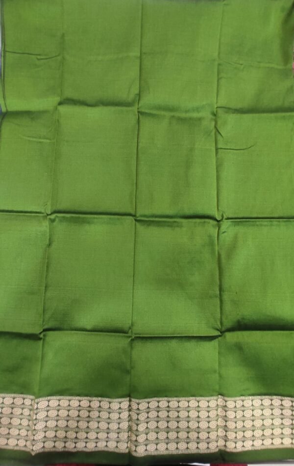 Green silk blouse piece with golden rudraksha border