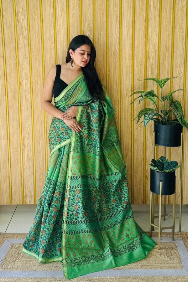 Green maheswari silk saree with zari border