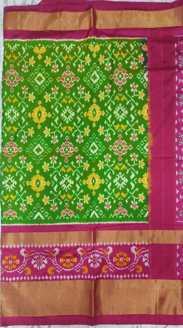 Parrot green and pink double ikkat pattu silk saree with zari border and anchal - Image 2